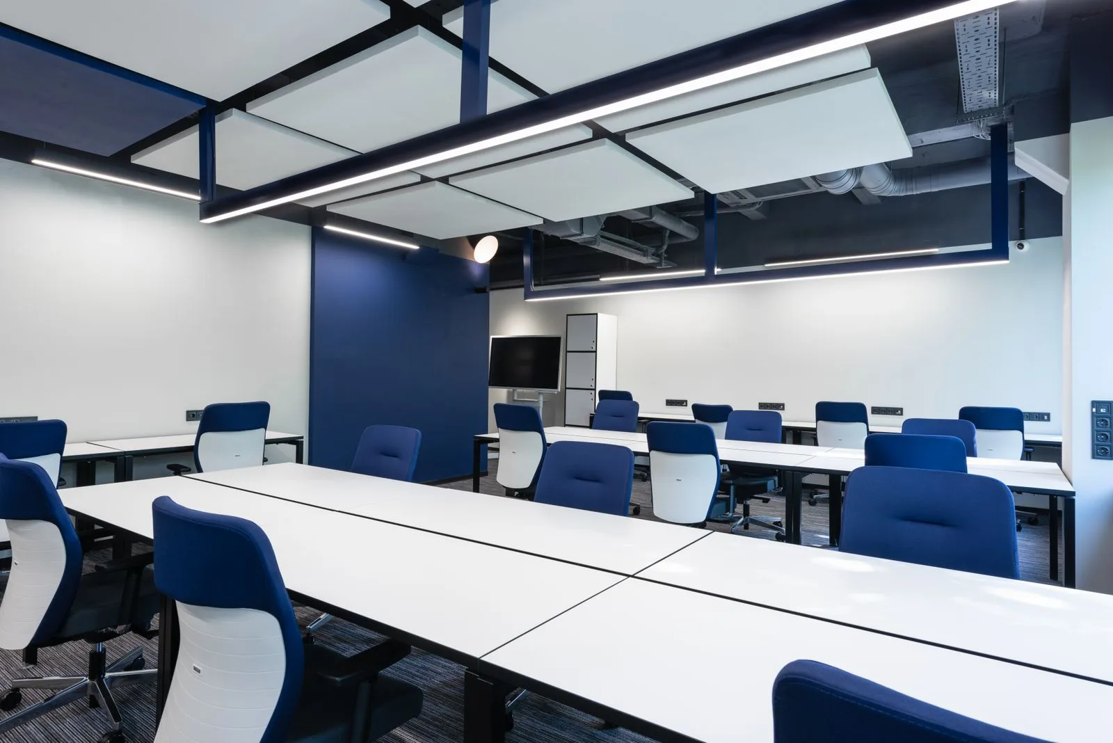Tidy open-plan office workspace cleaned by Clean By Gina